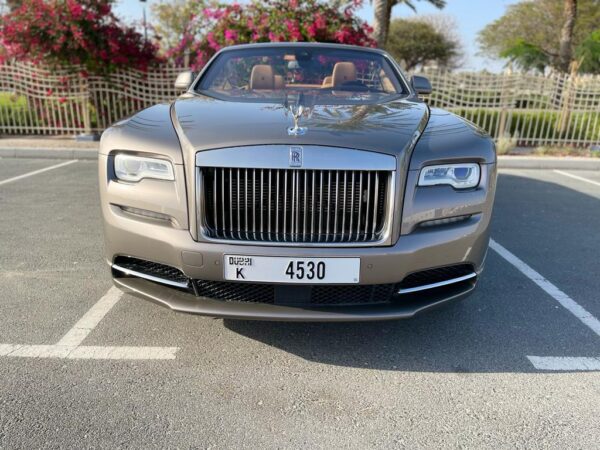 Experience opulence under the Dubai sun with our Rolls Royce Dawn rental in Dubai.