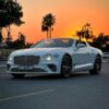 Unleash the power and prestige of a Bentley Continental GT Rental on Dubai's iconic roads.