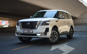 image shows the Nissan patrol rental with driver in dubai .